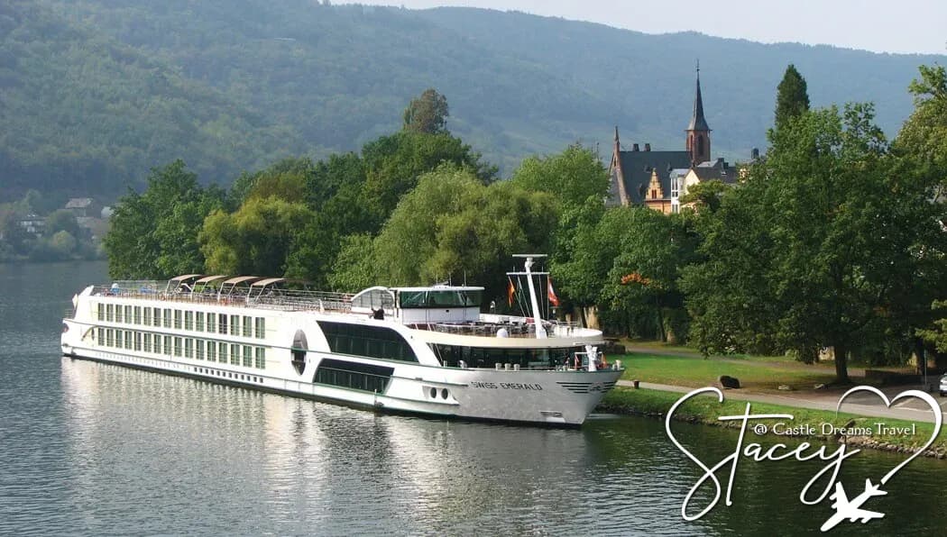 Tauck river cruise ship sailing past the town of Bernkastel