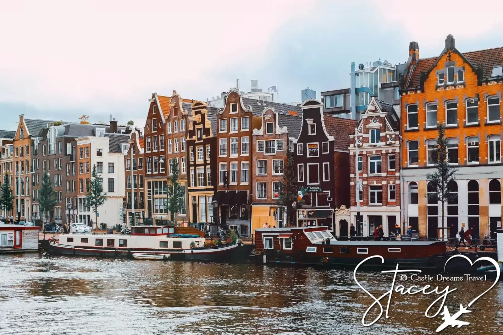 Gabled canal houses along an Amsterdam waterway
