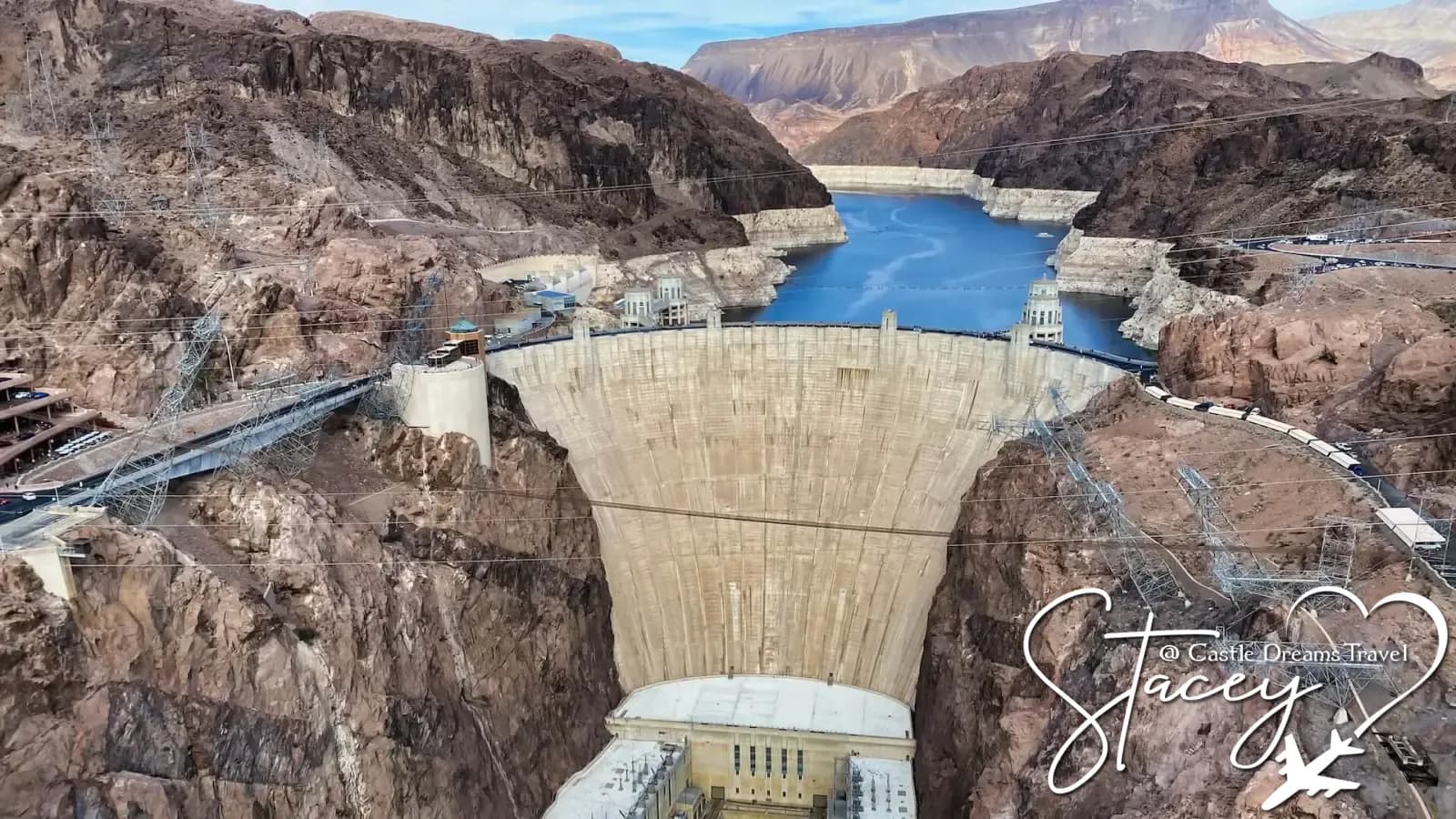Hoover Dam's curved concrete face spanning the Black Canyon