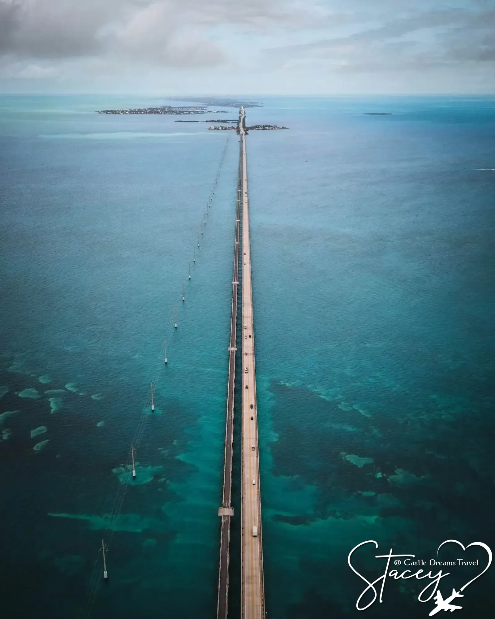 Aerial view of the Overseas Highway stretching across turquoise water in the Florida Keys
