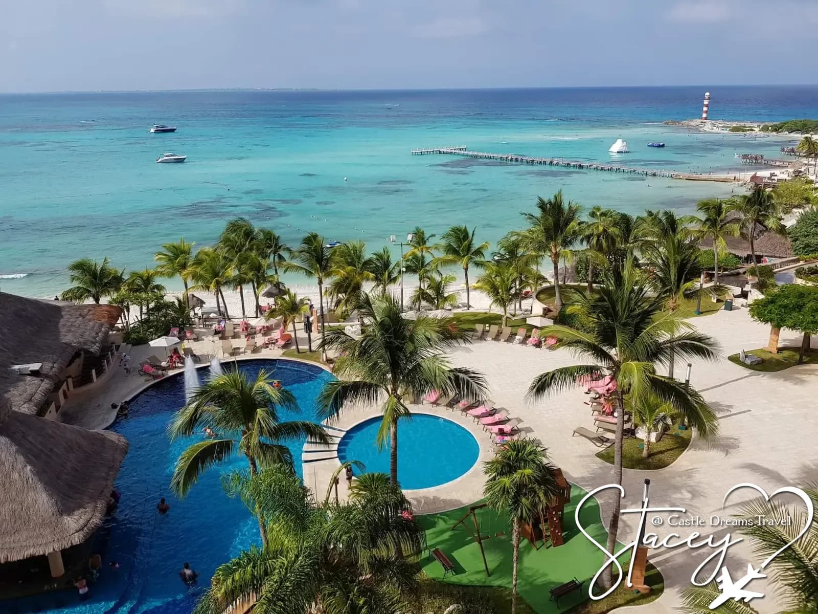 White sand beach with palms on Mexico's Caribbean coast