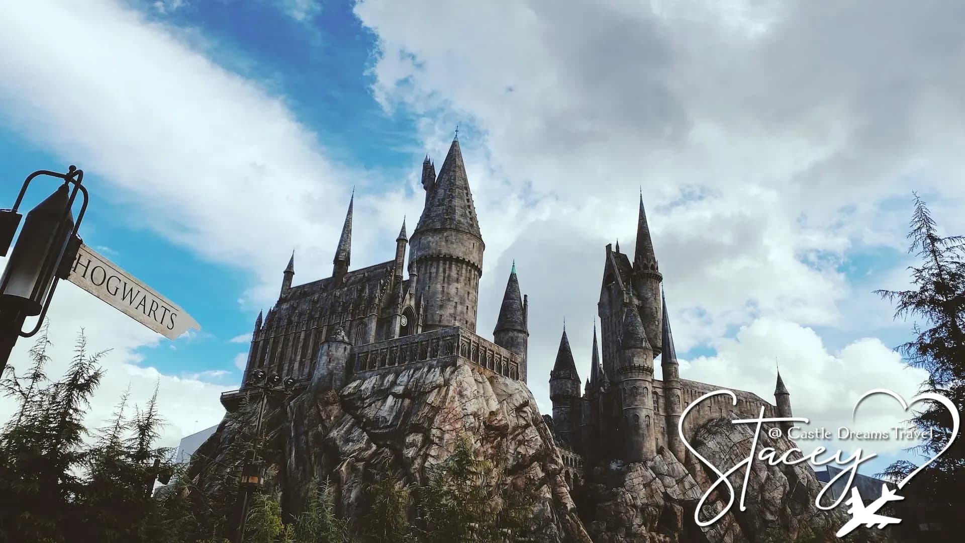 Hogwarts Castle rising above the cliffs in the Wizarding World of Harry Potter at Universal Orlando