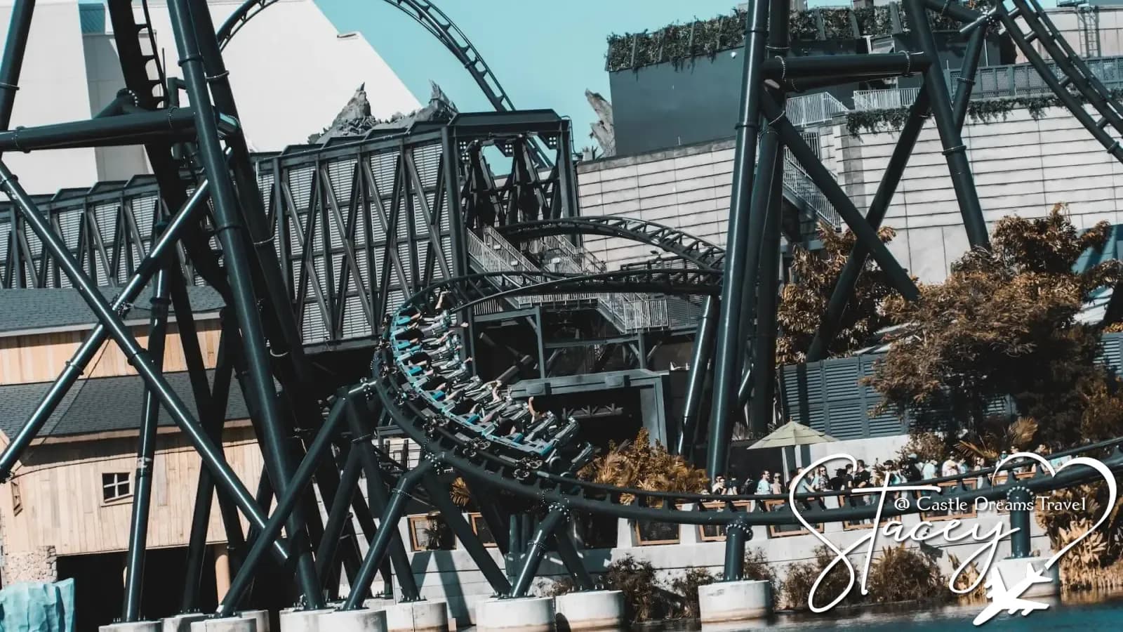 Roller coaster train weaving through the VelociCoaster track at Universal's Islands of Adventure