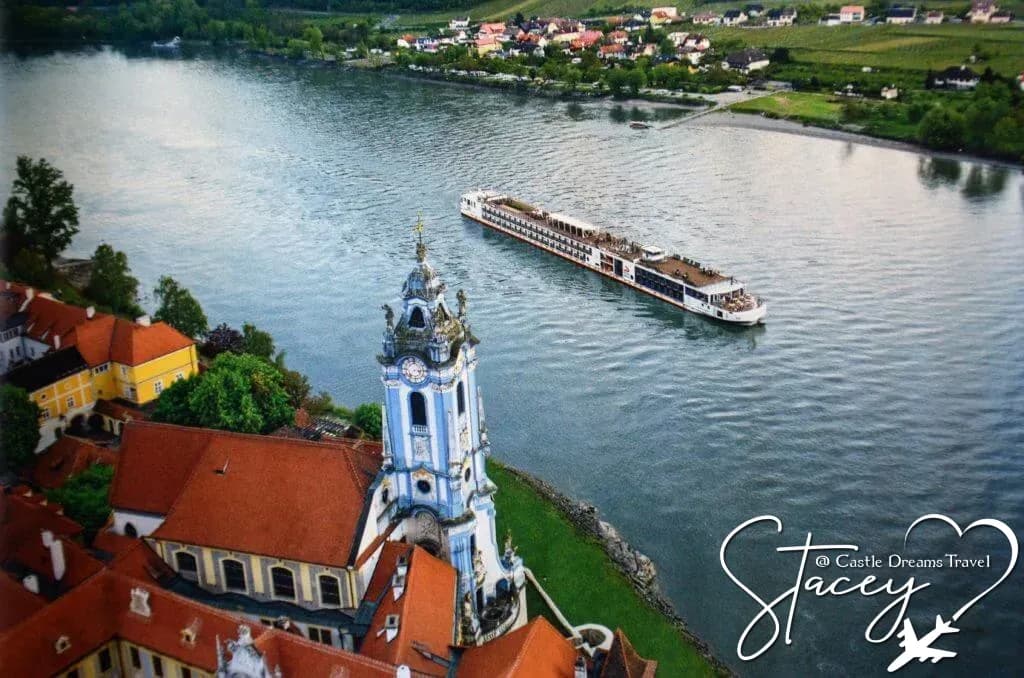 Viking river cruise longships lined up on a European river
